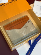 Louis Vuitton small card holder, beige monogram canvas with tan card slot and stitching