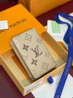 Beige monogram card holder wallet with logo pattern and stitched edges
