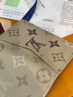 Beige monogram wallet with logo pattern and layered card slot sections