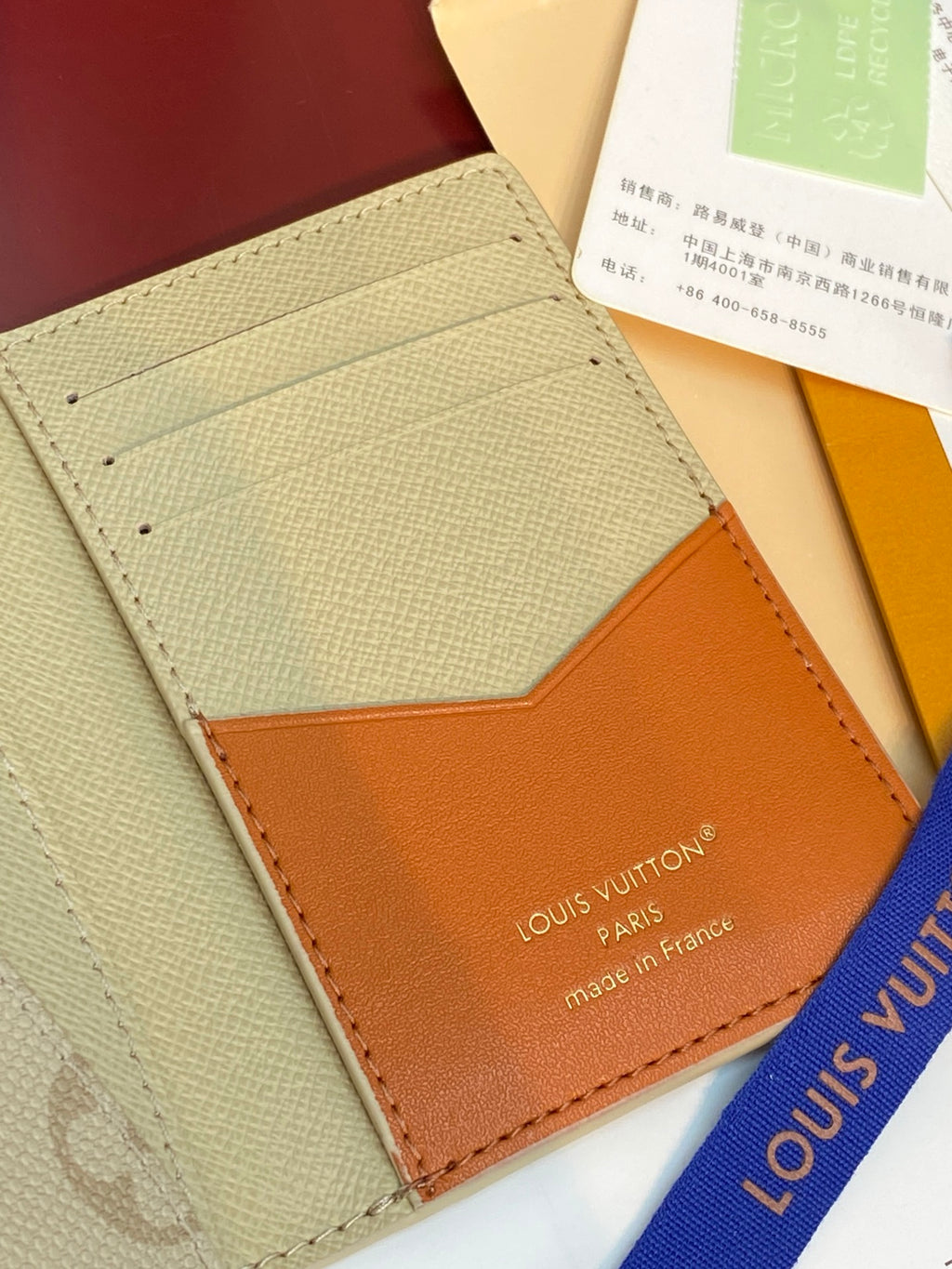 Monogram card holder, beige card pocket with orange leather backing and visible stitching