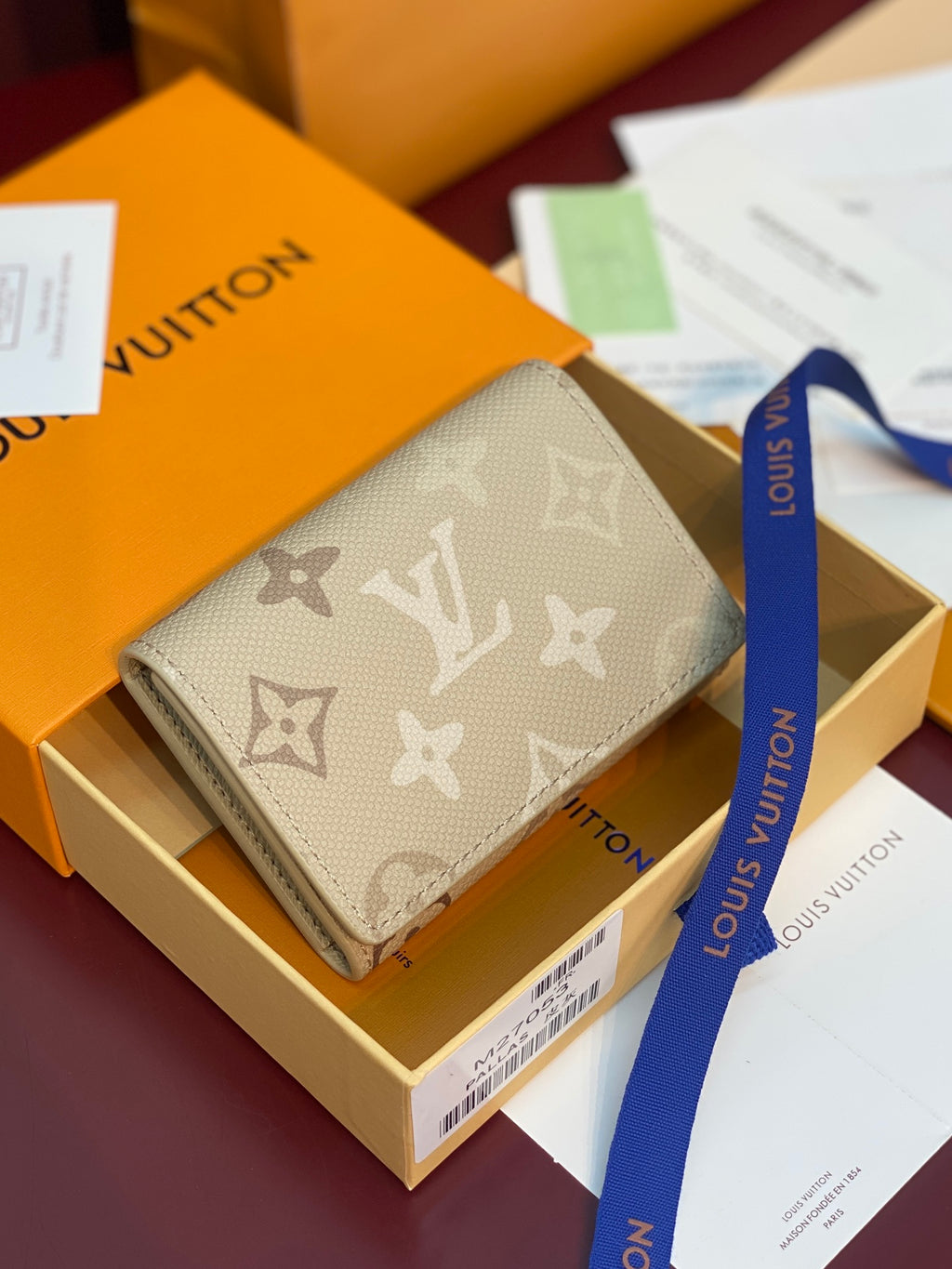 Louis Vuitton monogram wallet, light beige canvas with flap and gold button