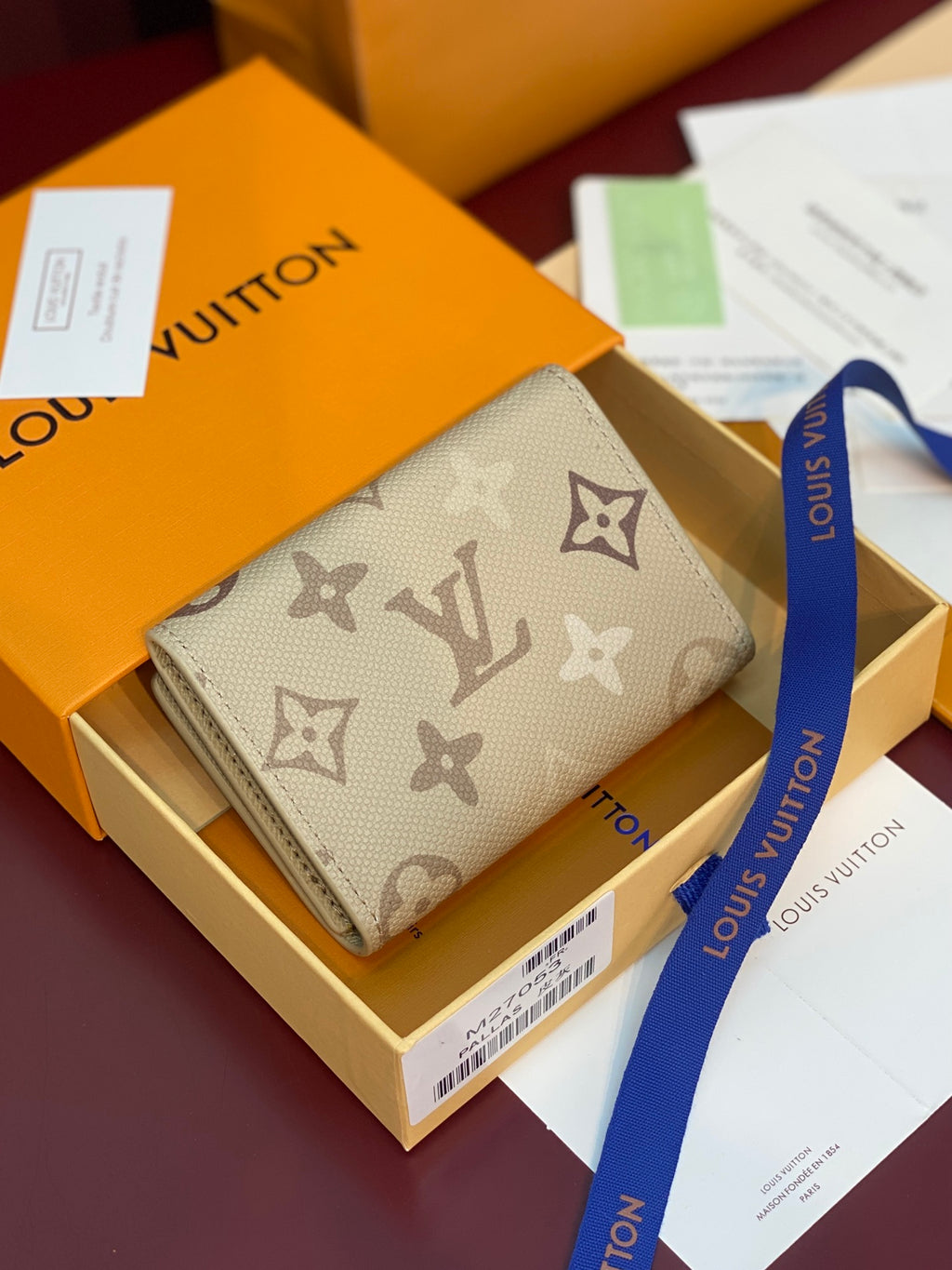 Louis Vuitton monogram wallet with front flap, light beige canvas and gold hardware