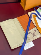 Louis Vuitton monogram card wallet, cream and orange interior with card slots