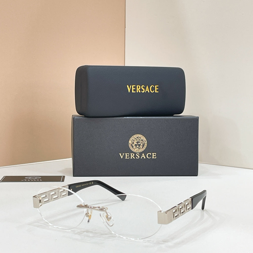 Designer eyeglasses with clear lenses and silver geometric temple detailing