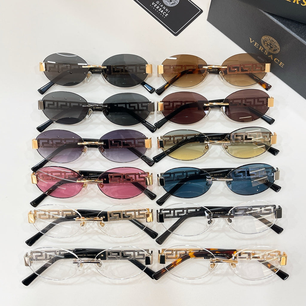 Versace sunglasses assortment with multiple lens colors, featuring Greek key gold temples