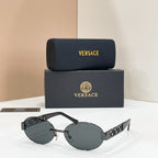 Versace round sunglasses with dark gray lenses and black frame, featuring gold temple accents