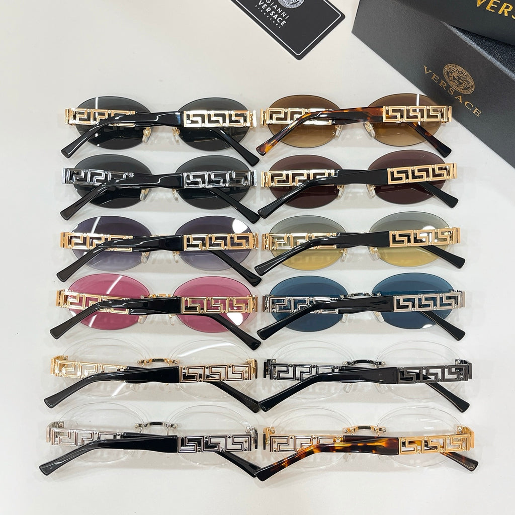 Versace sunglasses assortment with black frames, Greek key detailing, and colored lenses