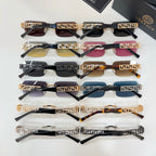 Assorted Versace sunglasses set with mixed lens colors and gold Greek-key frames
