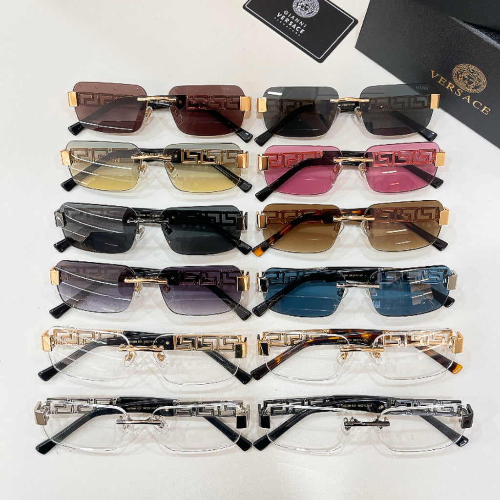 Assorted Versace sunglasses set with colored lenses and gold Greek-key frames