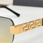 Gold Versace sunglasses temple with Greek-key pattern and cutout link detail