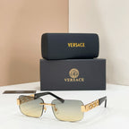 Versace sunglasses with light lenses, gold frame and Greek-key temples