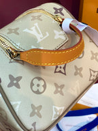 Louis Vuitton monogram crossbody bag, beige canvas with tan strap and gold hardware