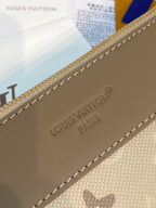 Small pouch bag corner detail with Louis Vuitton stamp and stitched leather trim