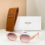 Celine sunglasses with pale pink lenses and gold-tone frame, shown with brown case