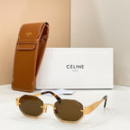 Celine sunglasses with dark lenses and gold-tone frame, shown with brown case