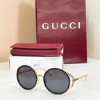 Gucci round sunglasses, black frame with dark smoke lenses
