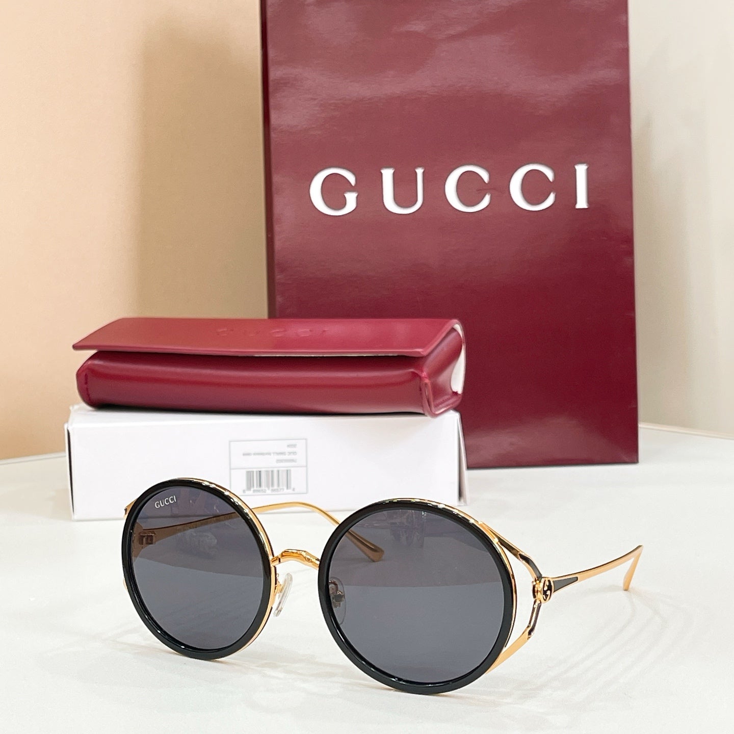 Gucci round sunglasses, black frame with dark smoke lenses
