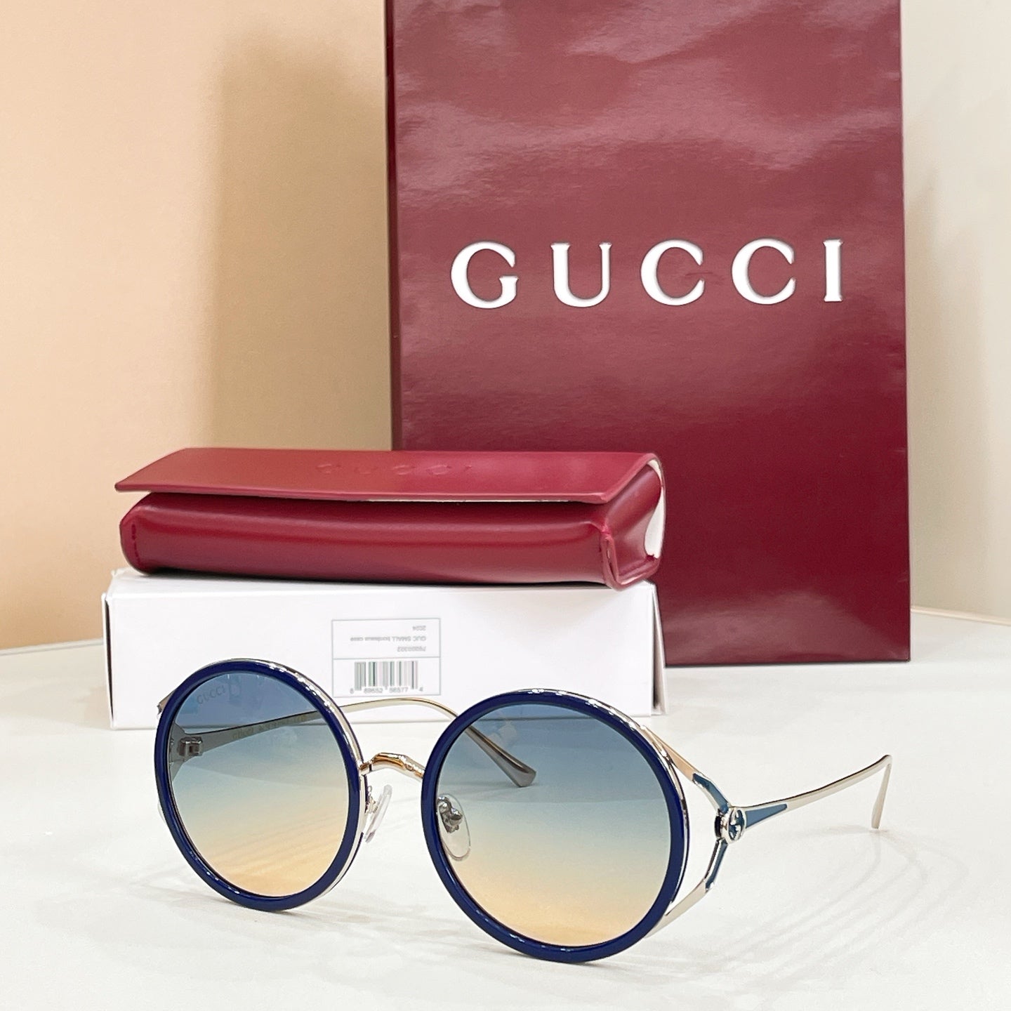Gucci round sunglasses, blue frame with mirrored blue lenses