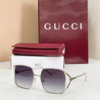 Gucci oversized square sunglasses with silver-toned frame and dark purple lenses