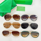 Assorted round sunglasses with mixed frame colors and tinted lenses