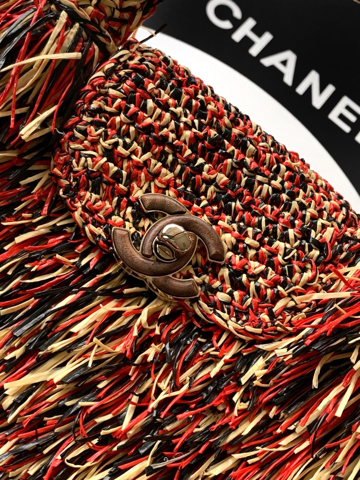 Chanel fringe handbag clasp with metal CC emblem detail