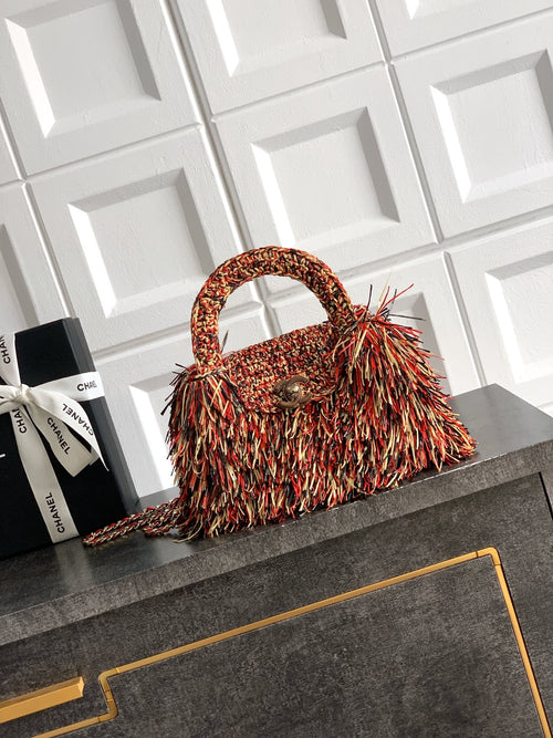 Chanel small top-handle handbag with multicolor fringe and chain strap