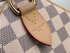 Louis Vuitton Damier handbag leather tag patch with stitched logo and brown border