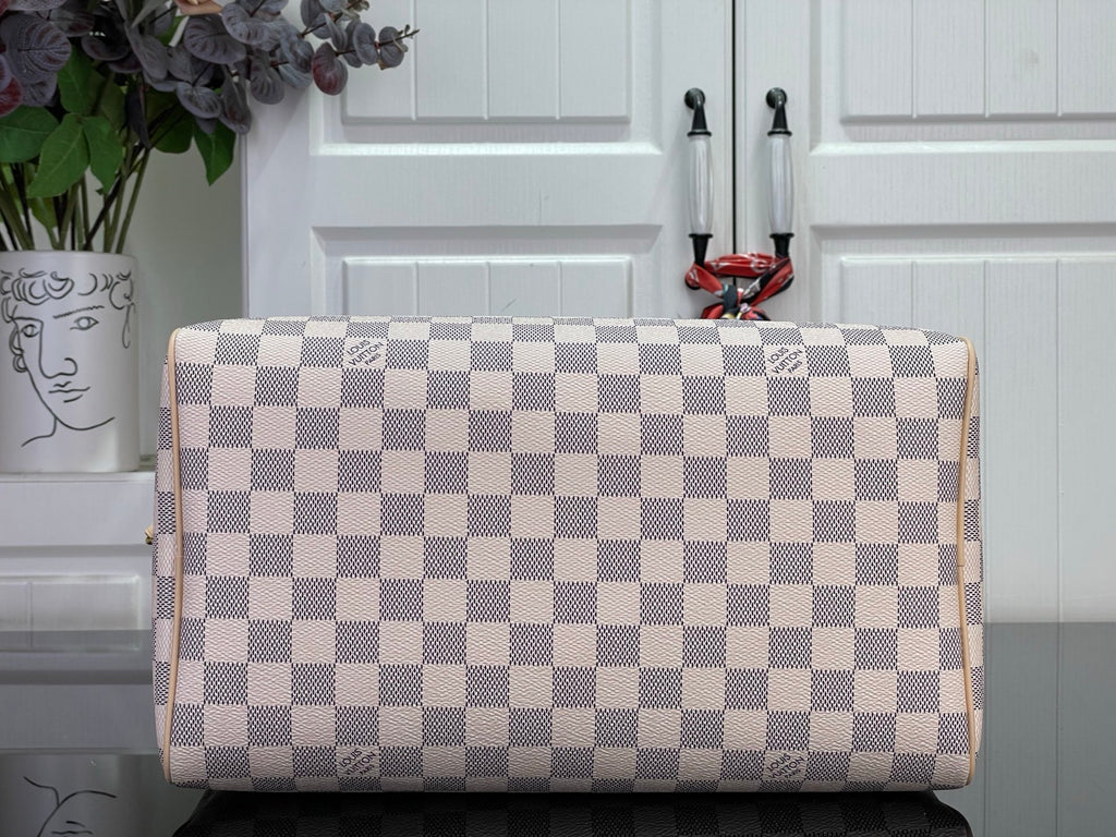 Louis Vuitton Damier checkered handbag, front view with top handle opening