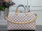 Louis Vuitton Damier checkered handbag with braided handles and small front charm