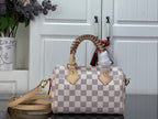 Louis Vuitton damier check handbag with top handles and beige shoulder strap