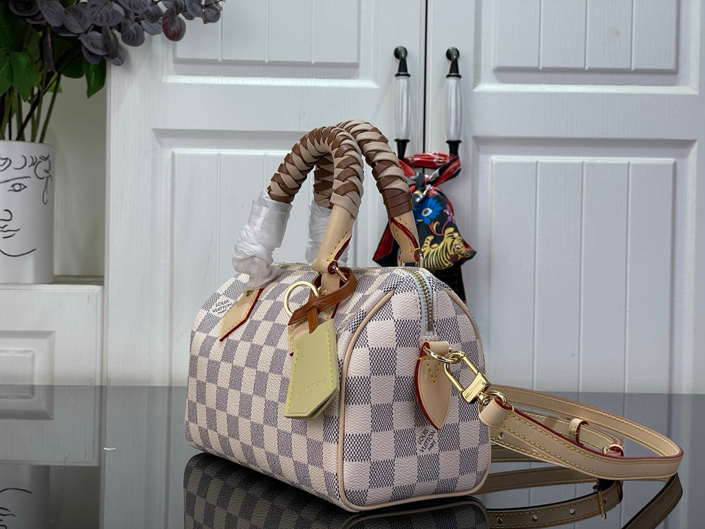Louis Vuitton damier check handbag with crossbody strap and scarf charm detail