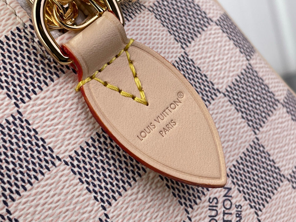 Louis Vuitton damier check leather nameplate on strap end with gold ring