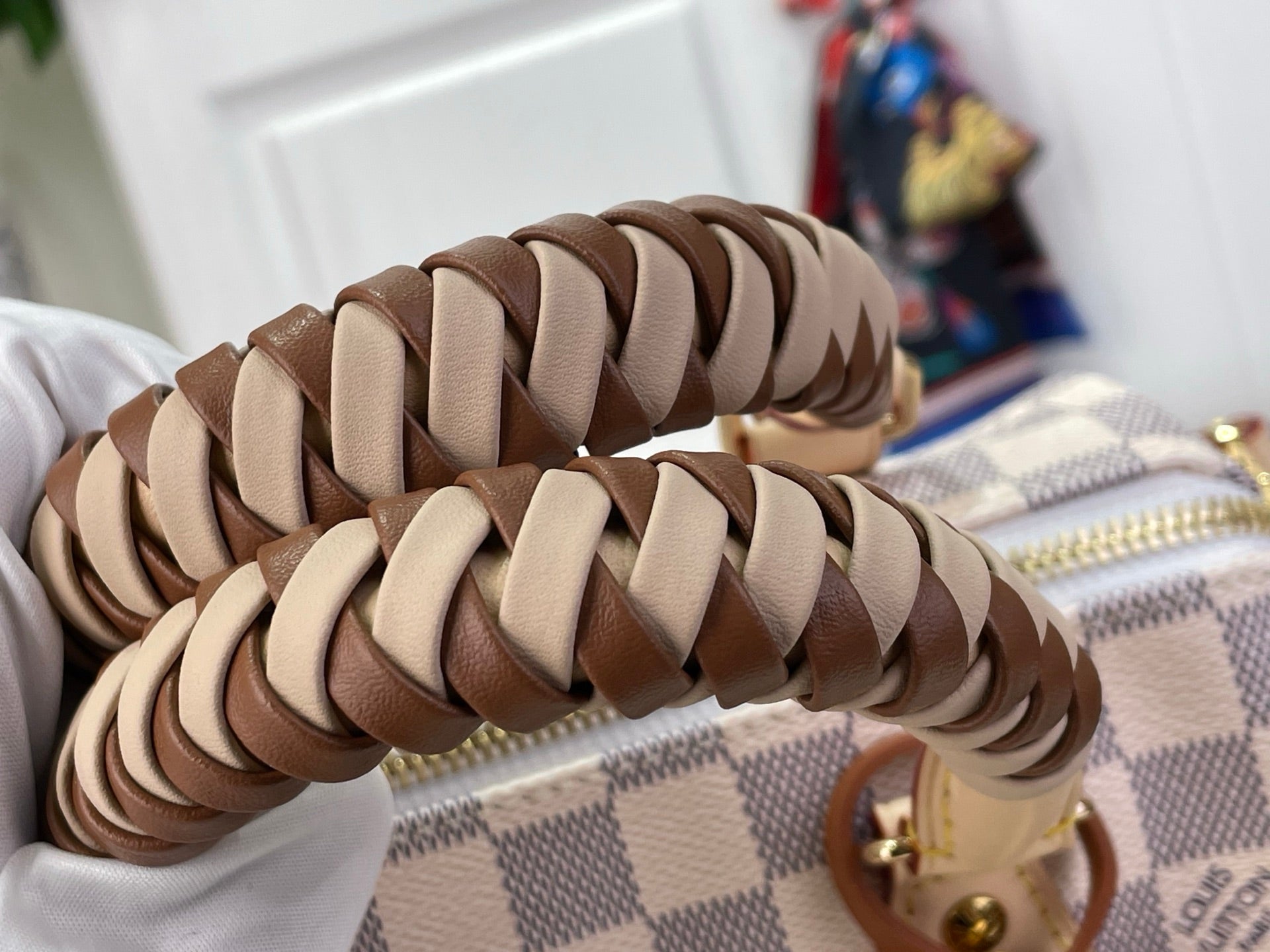 Louis Vuitton damier check braided top handles in beige and brown