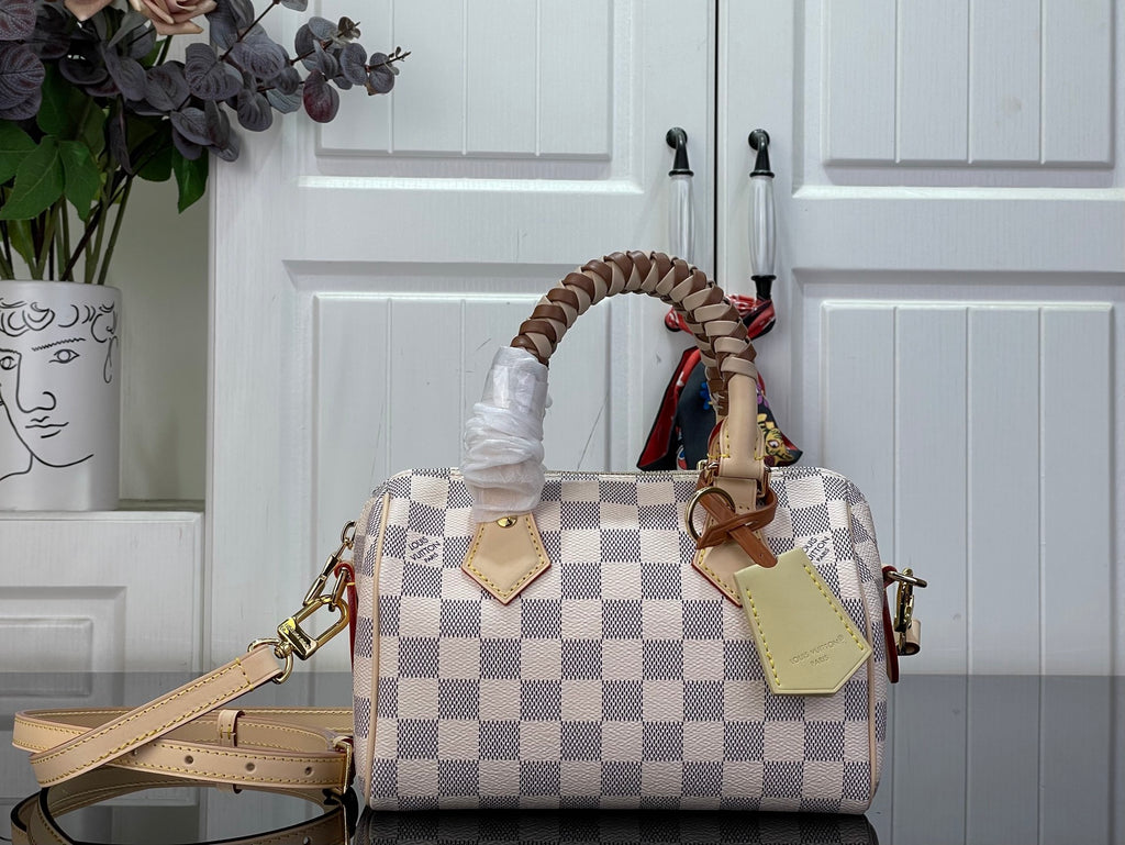 Louis Vuitton damier check top-handle handbag with braided handles and gold hardware