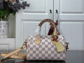 Louis Vuitton damier check top-handle handbag with braided handles and gold hardware