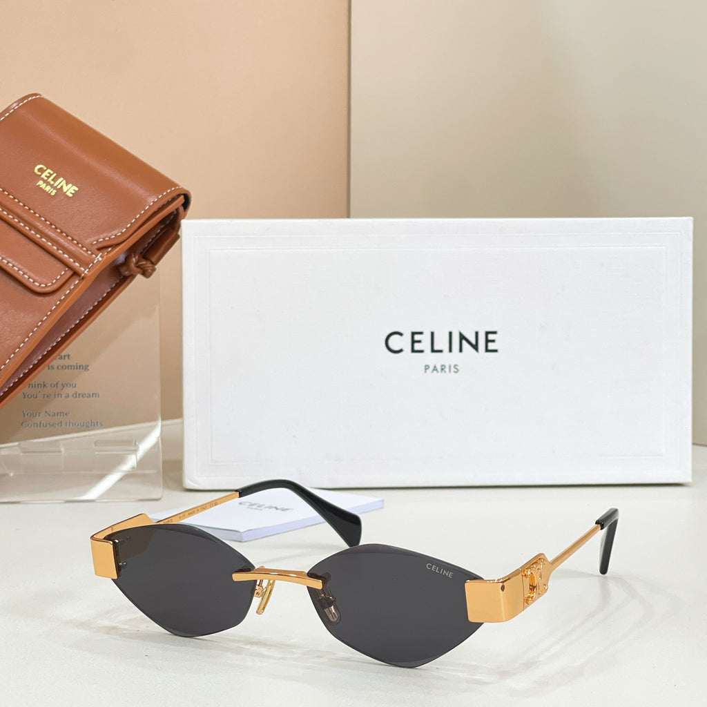 Celine cat-eye sunglasses with dark lenses, gold frame, black temples