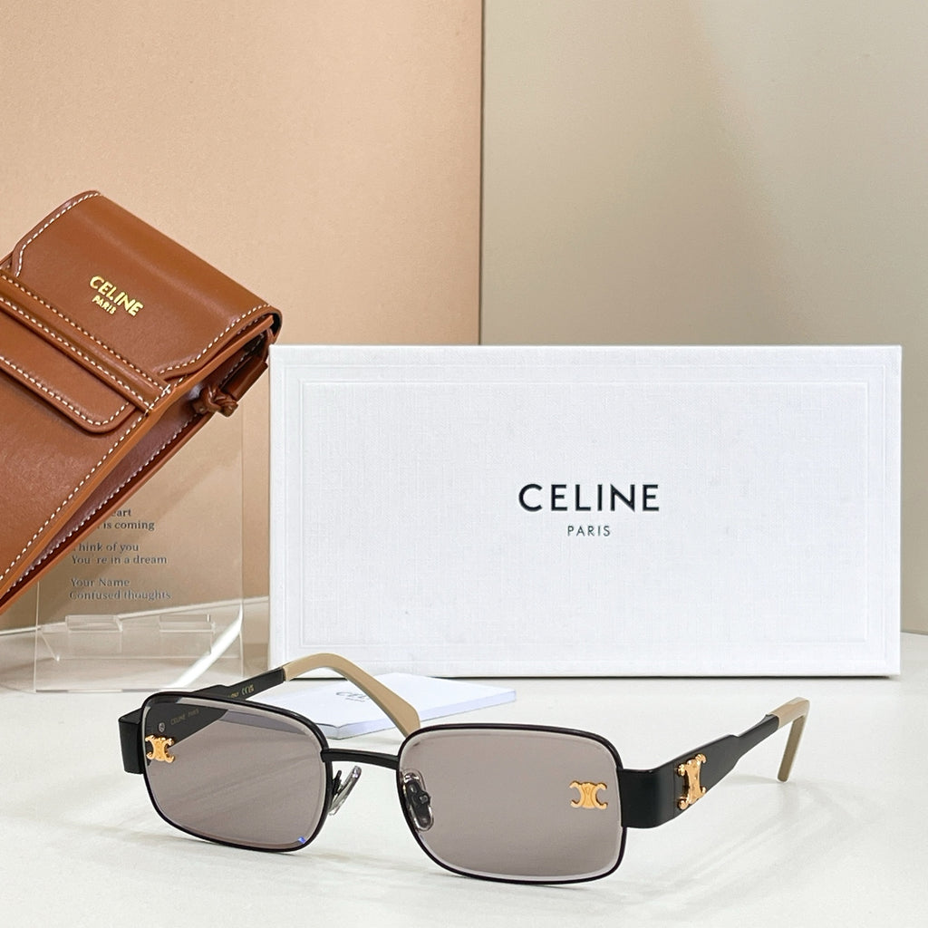 Square sunglasses with dark frame, gold accents, and dark tinted lenses