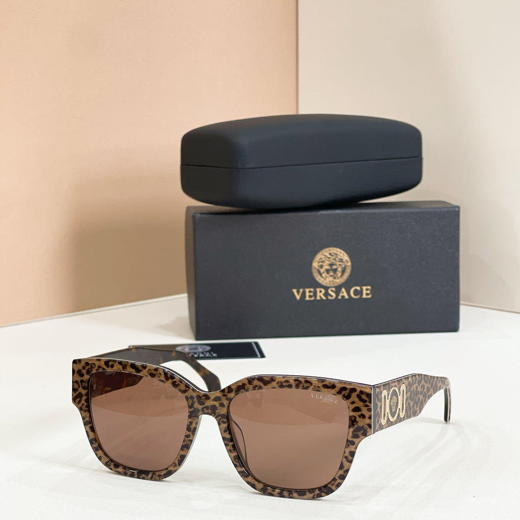 Leopard-print sunglasses with square frames and brown tinted lenses