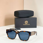 Tortoiseshell sunglasses with square frames and blue tinted lenses