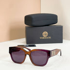 Tortoiseshell sunglasses with square frames and dark purple tinted lenses
