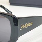 YSL sunglasses temple with Saint Laurent logo on dark frame