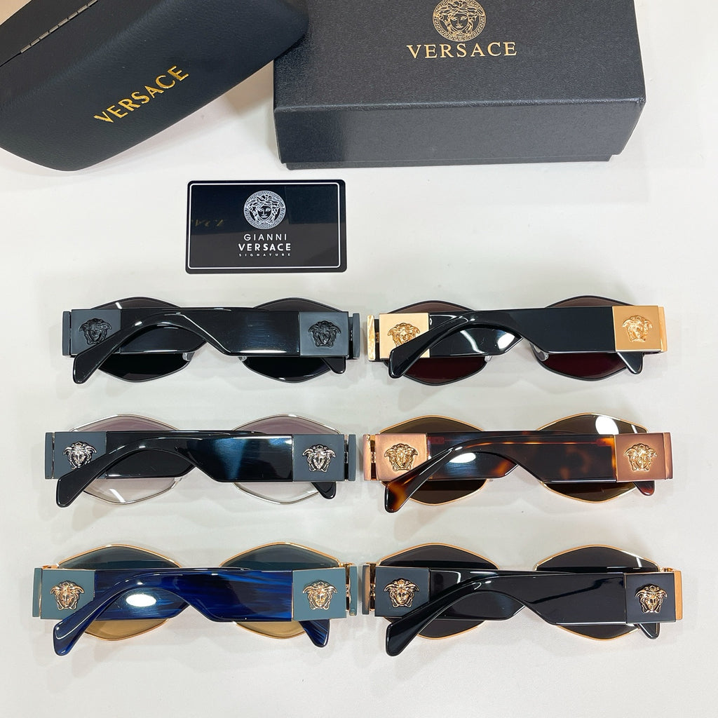 Versace sunglasses assortment with gold, tortoiseshell, and black frames; tinted lenses
