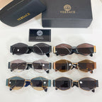 Versace sunglasses set in black, blue, brown, and gold frames with tinted lenses