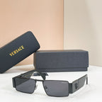 Rectangular sunglasses with black frame and dark lenses.