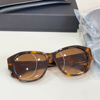 Tortoiseshell sunglasses front view with amber-tinted lenses