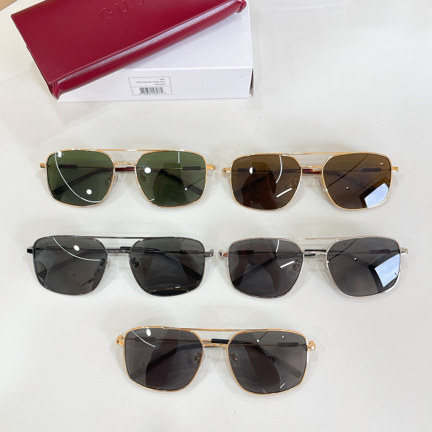 Set of Gucci sunglasses with mixed frames and tinted lenses