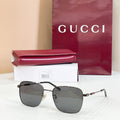 Gucci rectangular sunglasses with dark gray lenses and gold metal frame