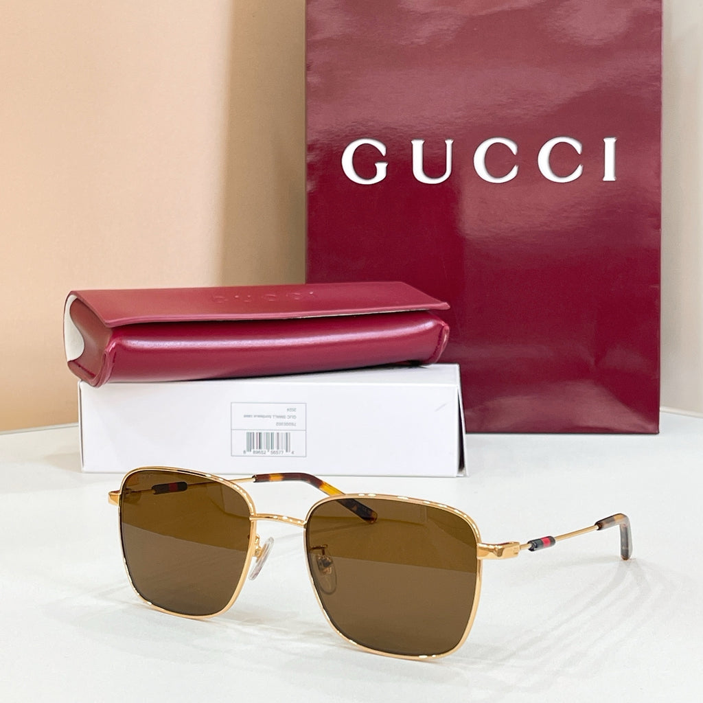 Gucci rectangular sunglasses with brown lenses and gold metal frame