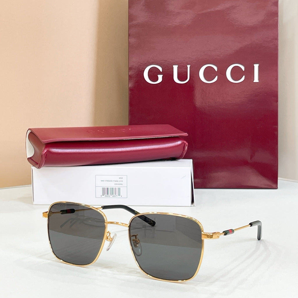 Gucci rectangular sunglasses with dark gray lenses and gold-tone metal frame