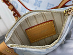 Louis Vuitton monogram pouch interior patch with gold zipper and tan leather trim